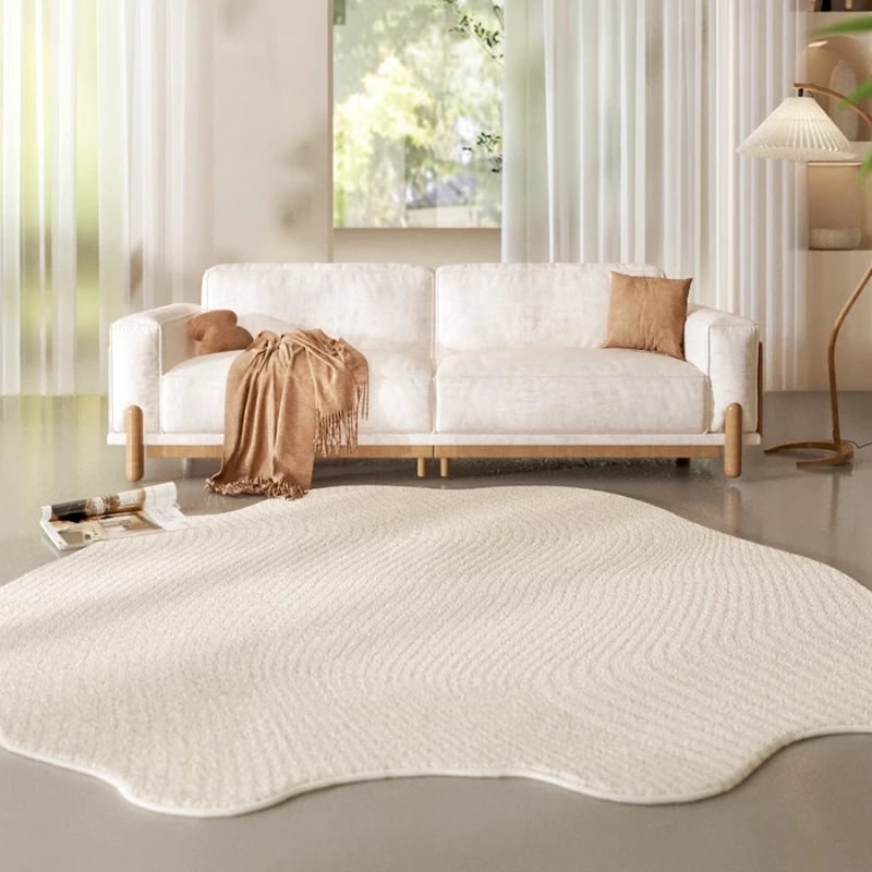 Area Rug with Irregular Shape Cream Textured Plush Low Pile for Living Room - Image 1