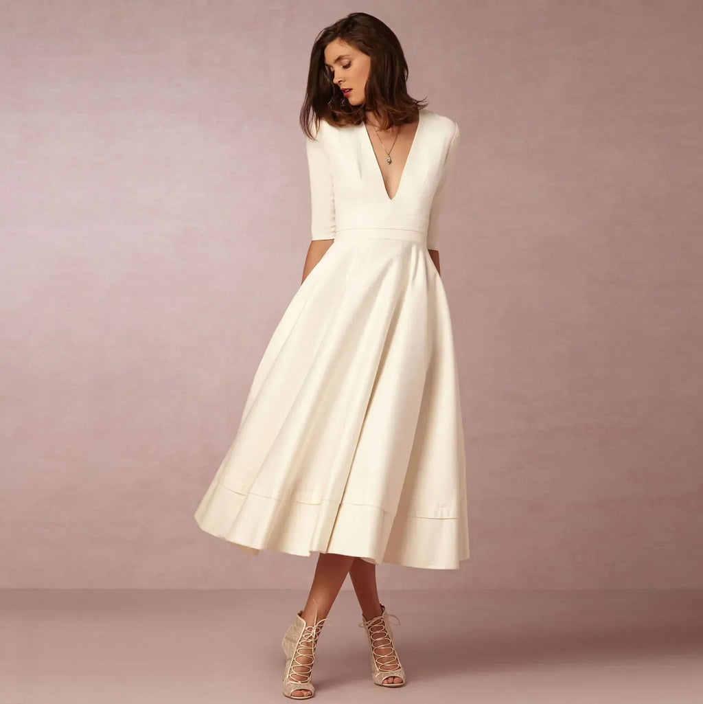 Deep V-Neck Fit-and-Flare Mid-Length Dress with Half Sleeves and Side Pockets — back view