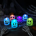 Halloween Battery Operated LED Tea Light Candles with Spooky Faces and Flameless Glow - Image 1