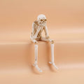 Halloween Skeleton Decorations Set of 3 Life Size Shelf Sitters with Dangling Legs Plastic - Image 1