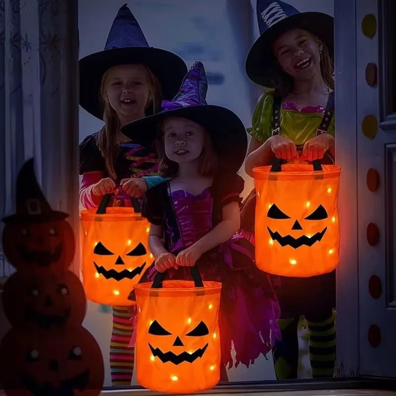 Kids' Halloween Candy Bucket with LED Light-Up Pumpkin Jack-O-Lantern Face for Trick or Treat - Image 4