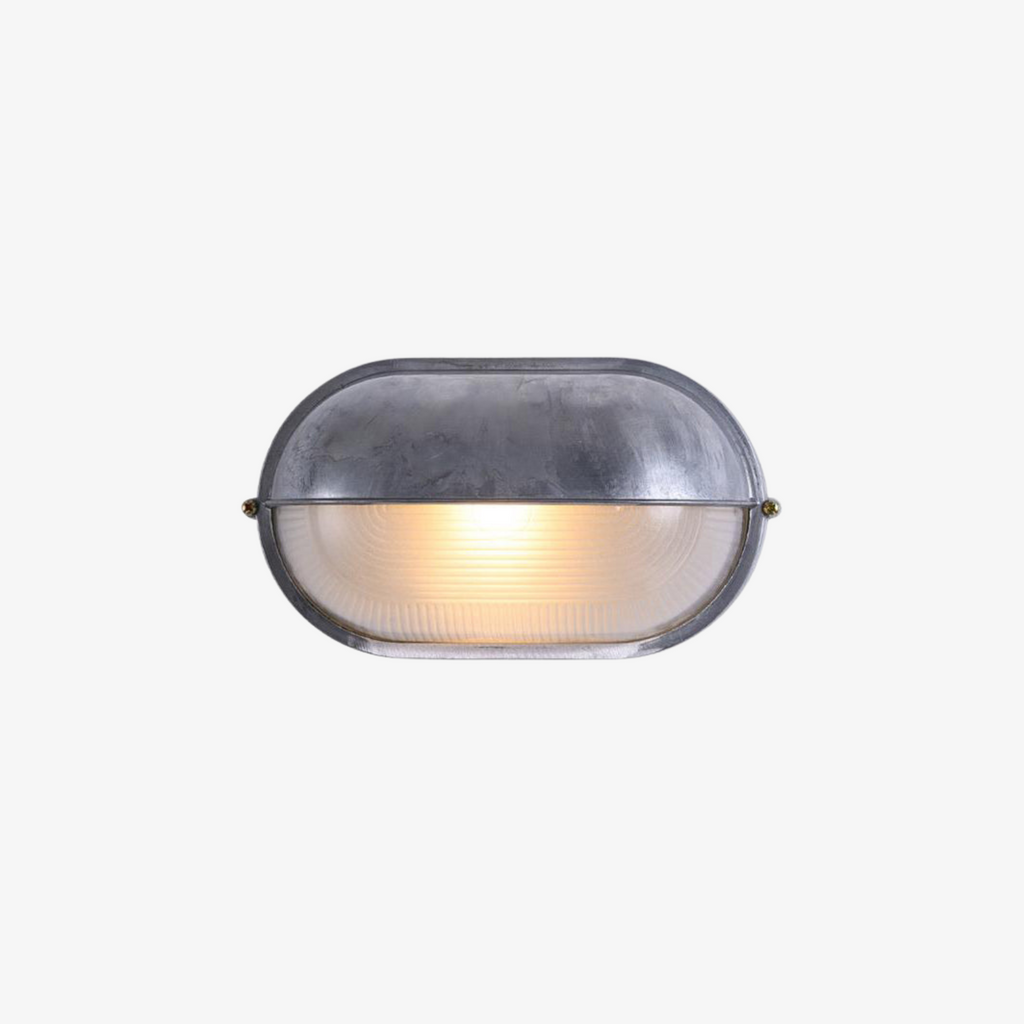Oval Bulkhead Wall Light with Weather-Resistant Eyelid Cover and Ribbed Glass Diffuser - Image 1