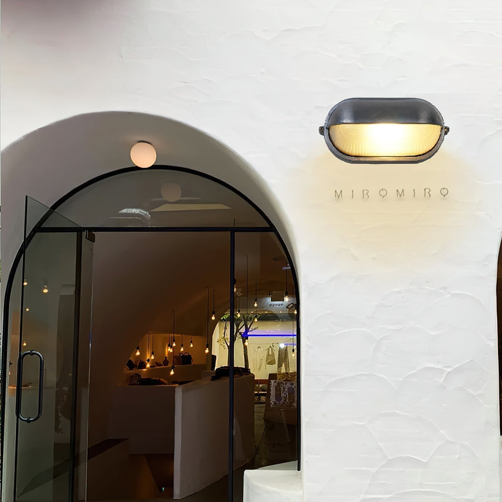 Oval Bulkhead Wall Light with Weather-Resistant Eyelid Cover and Ribbed Glass Diffuser - Image 4