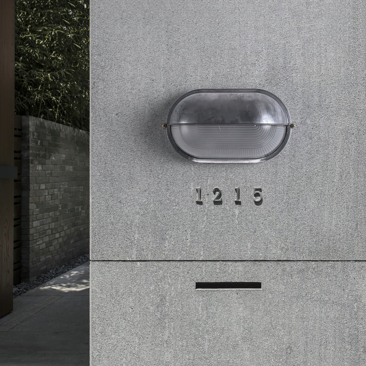Oval Bulkhead Wall Light with Weather-Resistant Eyelid Cover and Ribbed Glass Diffuser - Image 9