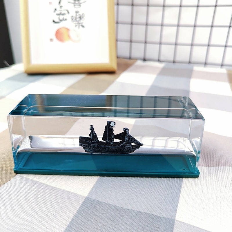 Unsinkable Ship Fluid Wave Paperweight with LED Light and Wooden Base - Image 10