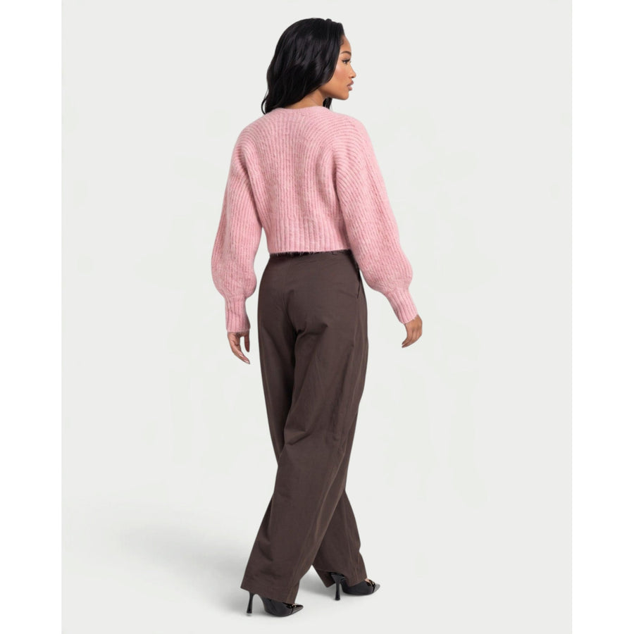 Il cardigan con chiusura a fermaglio sul davanti