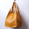 Women's Leather Tote Bag with Slouchy Hobo Design and Magnetic Snap Closure for Work - Image 1